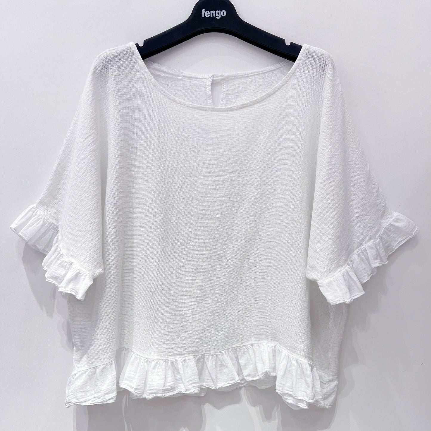 The Ruffle Bloom Linen Top